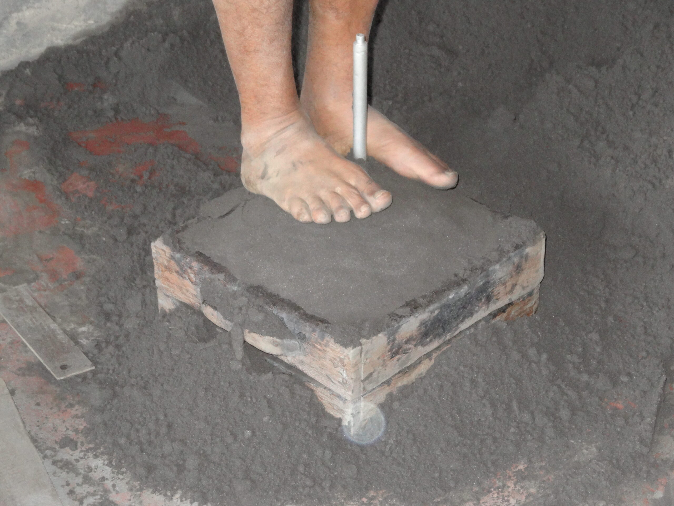 Step 4 – Compacting the mould by foot